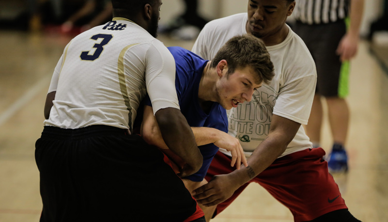 men playing basketball