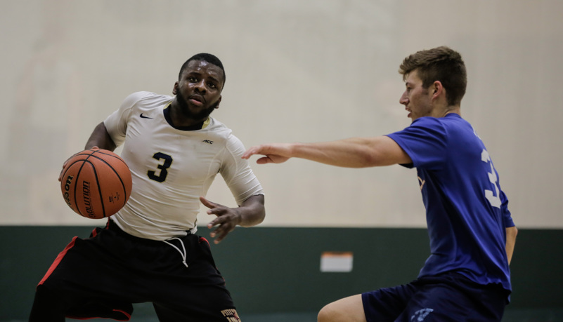 men playing basketball