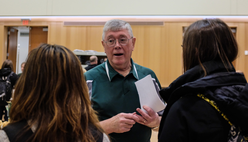 Students talking to the Alumni association