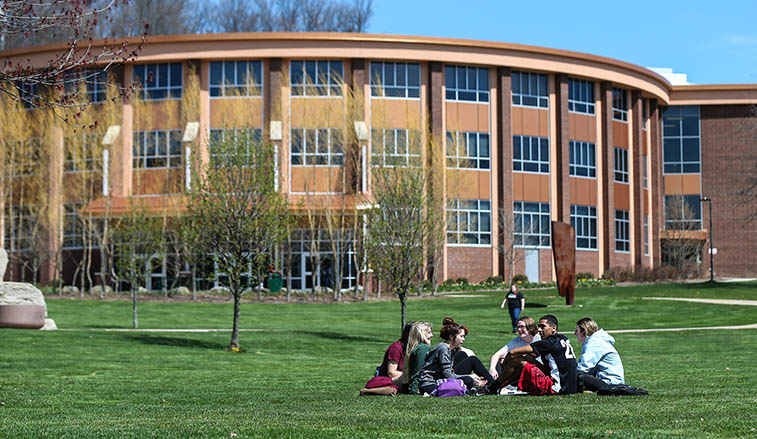 Student sitting in the quad