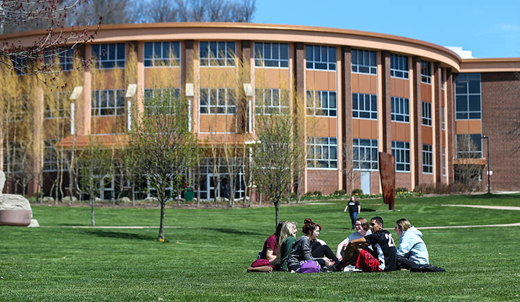 Student sitting in the quad
