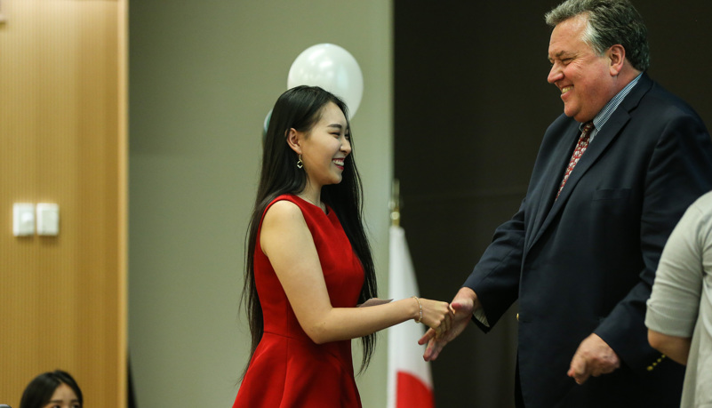 Global graduates receive their pins