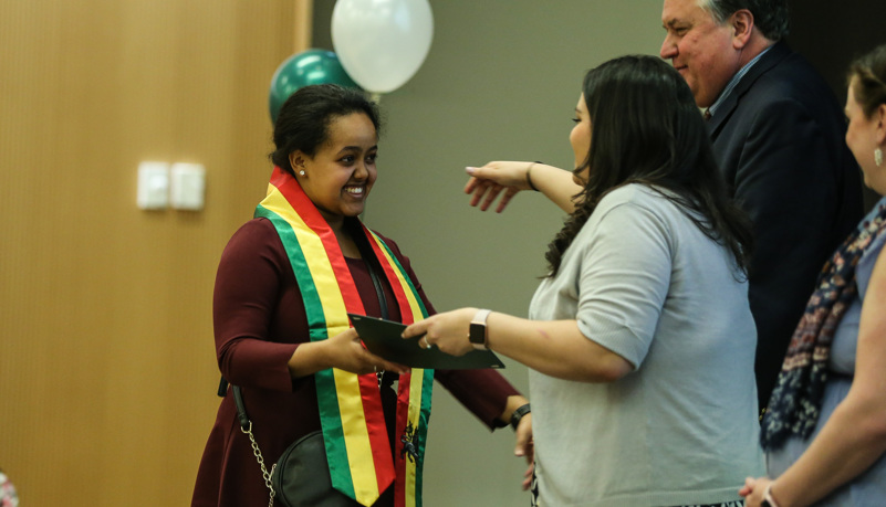 Global graduates receive their pins