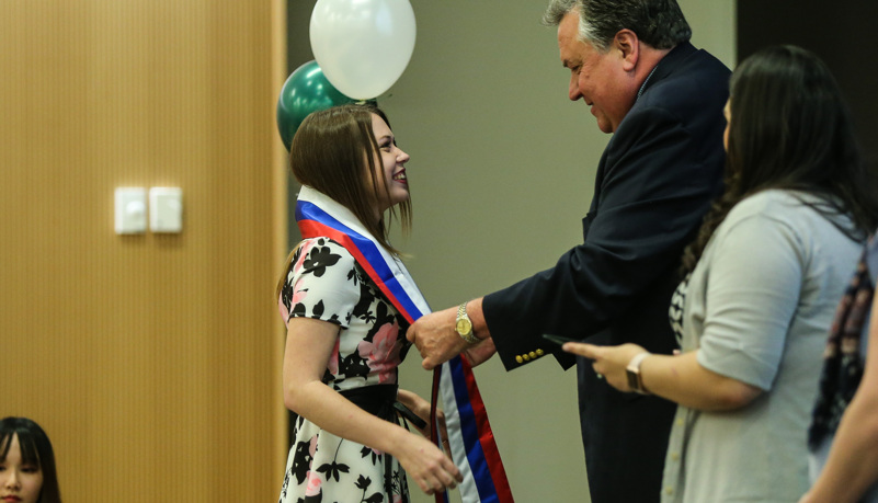 Global graduates receive their pins