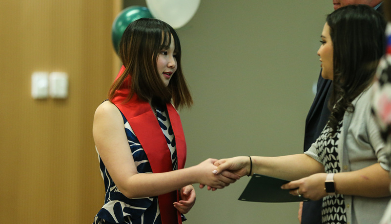 Global graduates receive their pins