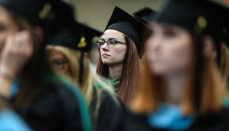 Woman listens to the address