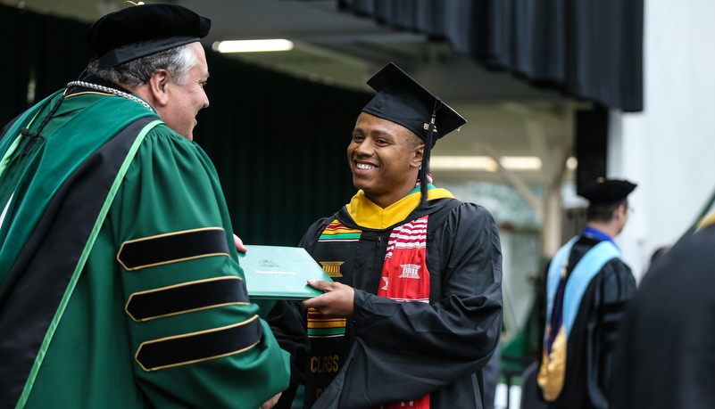 Man receives diploma