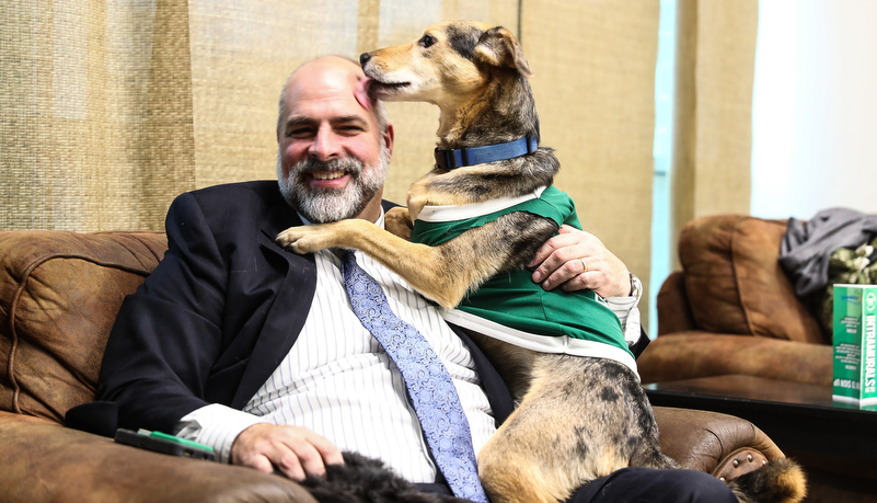 President Behre with his dog Oscar