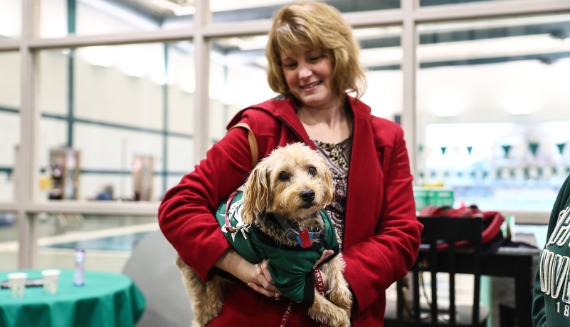 Woman holding a dog