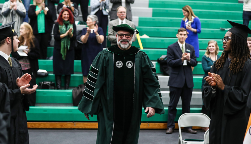 President Behrte enters the ceremony