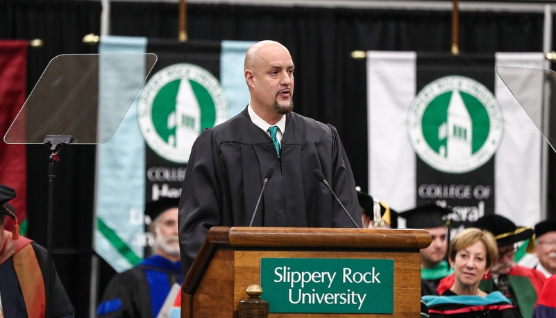 Man speaking to the attendees