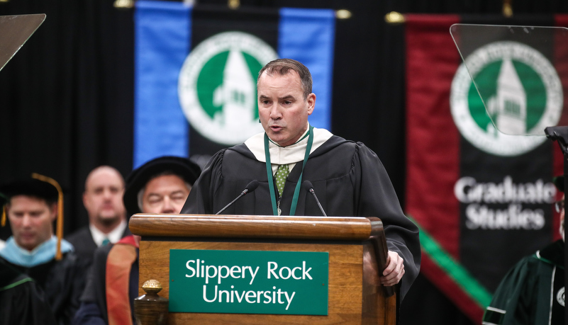 Man speaking to the attendees