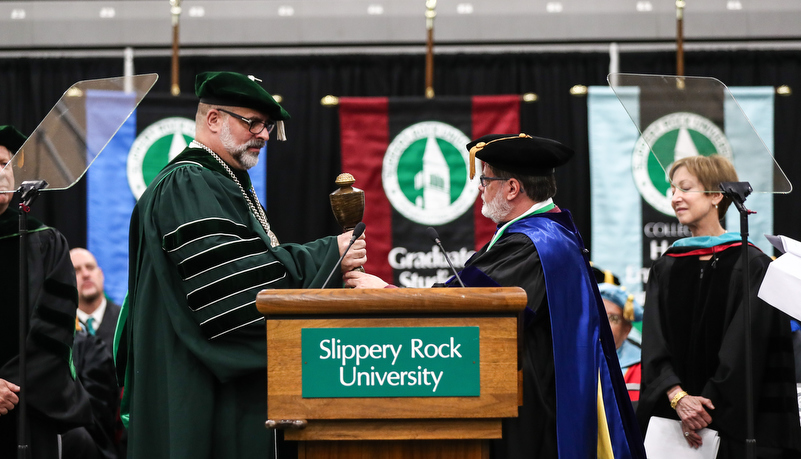 President Behre accepts the university mace