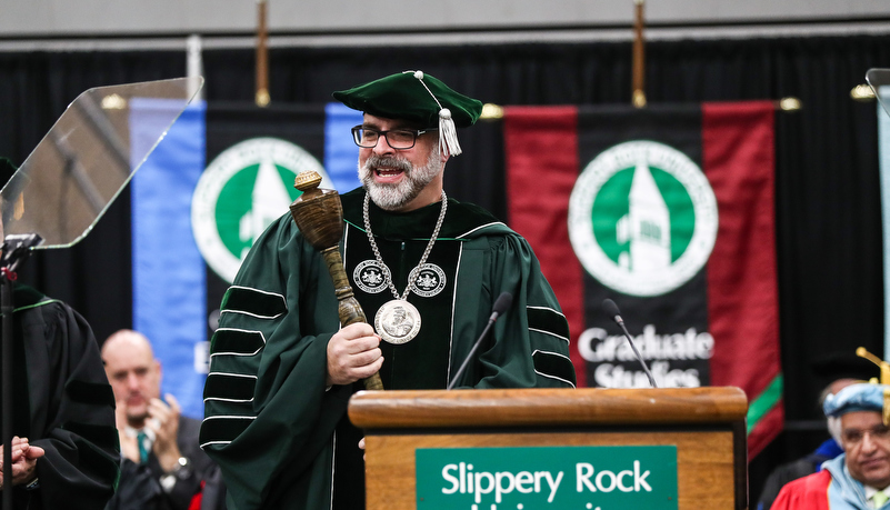 President Behre accepts the university mace