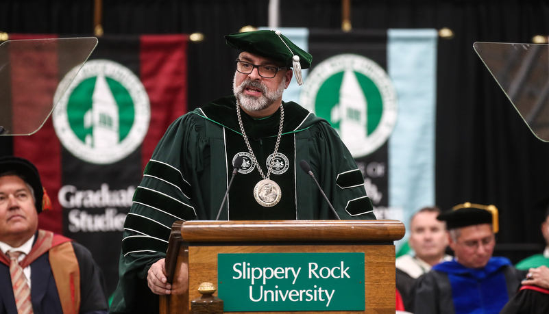 President Behre accepts the university mace