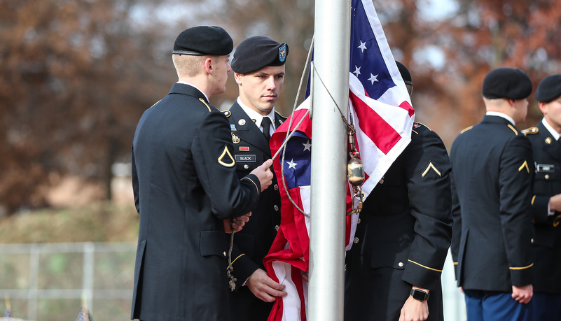 ROTC cadets raise the American Flag