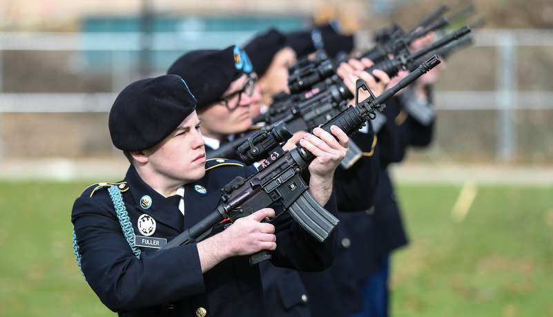 ROTC cadets conduct a 21 gun salute