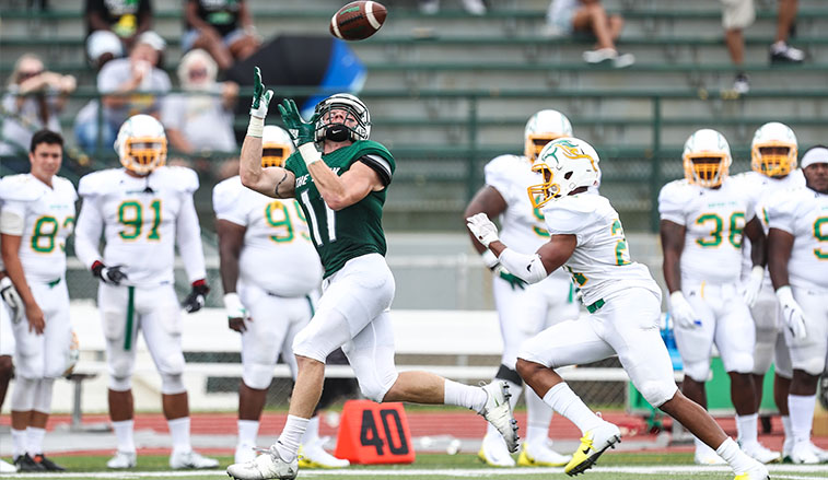 footabll player catching a pass