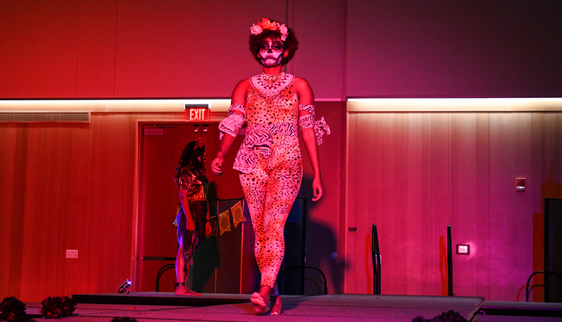 Woman dancing in make up and costume