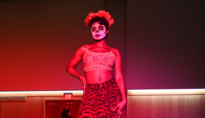 Woman dancing in make up and costume