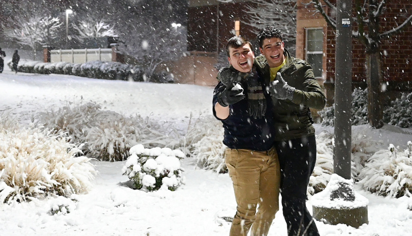 Students playing in the snow