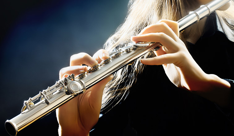 Woman playing a flute