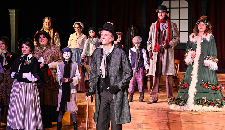 Students performing a Christmas Carol