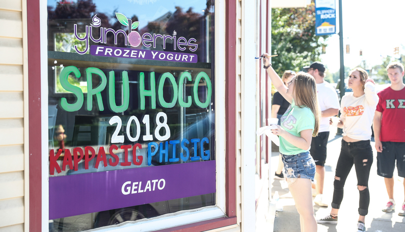 Students painting windows