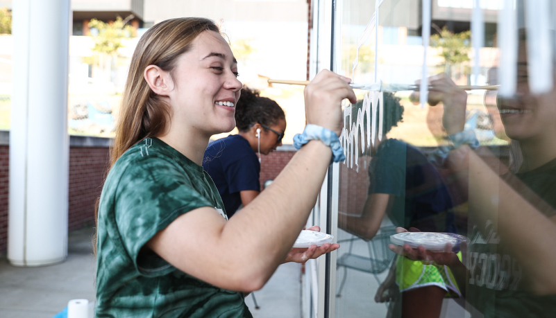 Students painting windows