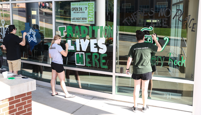 Students painting windows