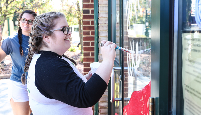 Students painting windows