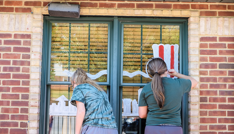 Students painting windows