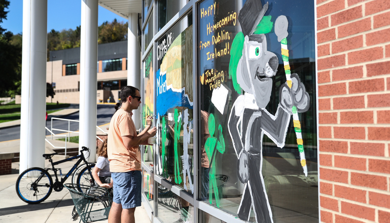 Students painting windows