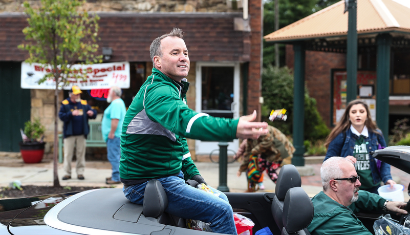 parade participant throws candy