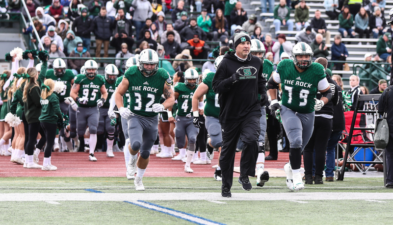 football team takes the field