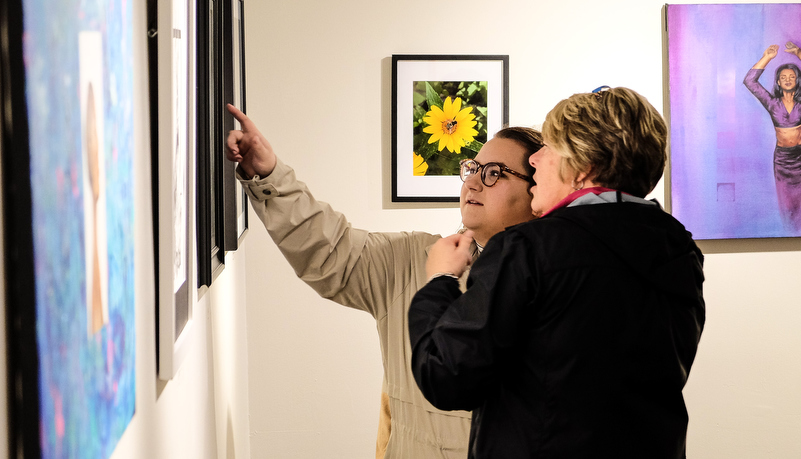 women looking at art