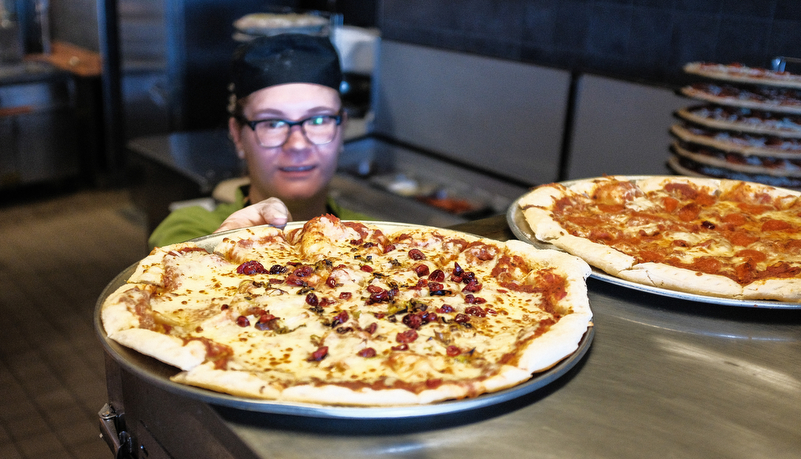 AVI cook making pizza