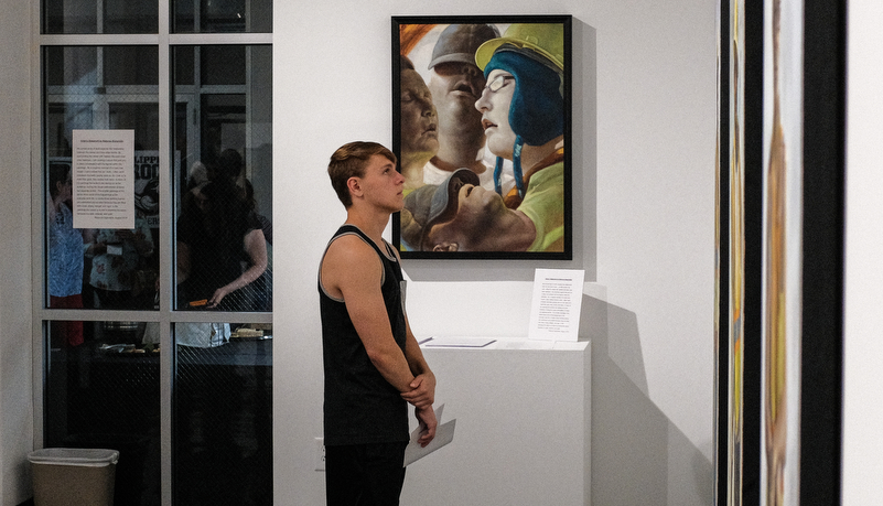 Vistors looking at art