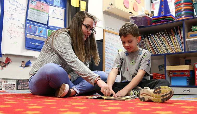 student teaching a pre-schooler