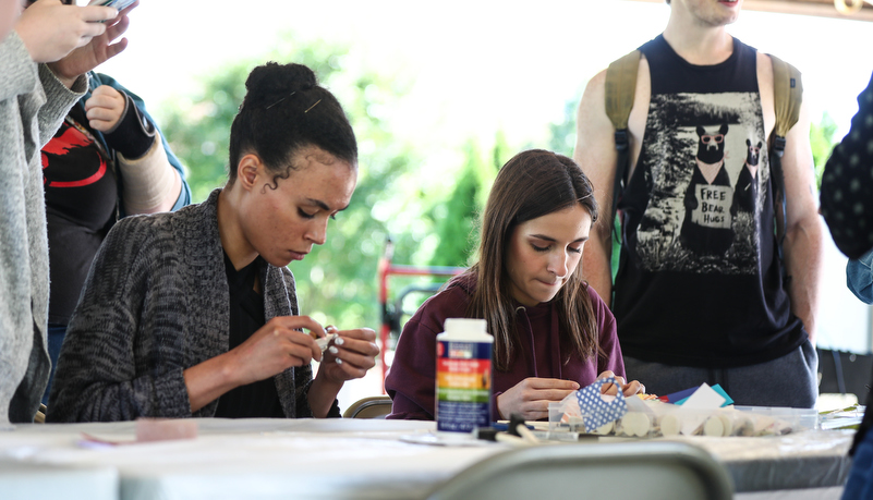 Students making pins