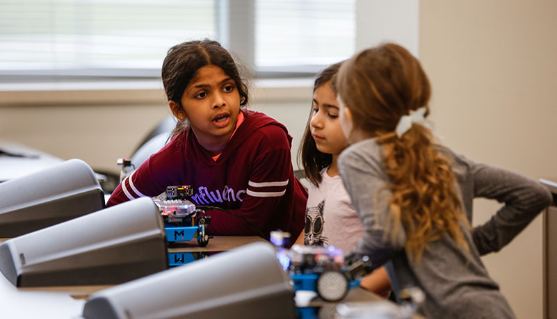 three children learning