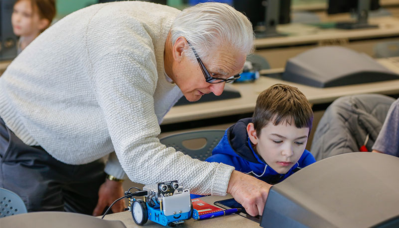 teacher helping child