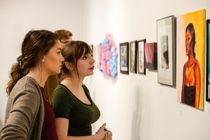 women looking at art