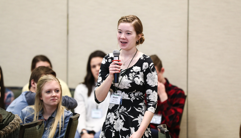 High school students listening to a presentation