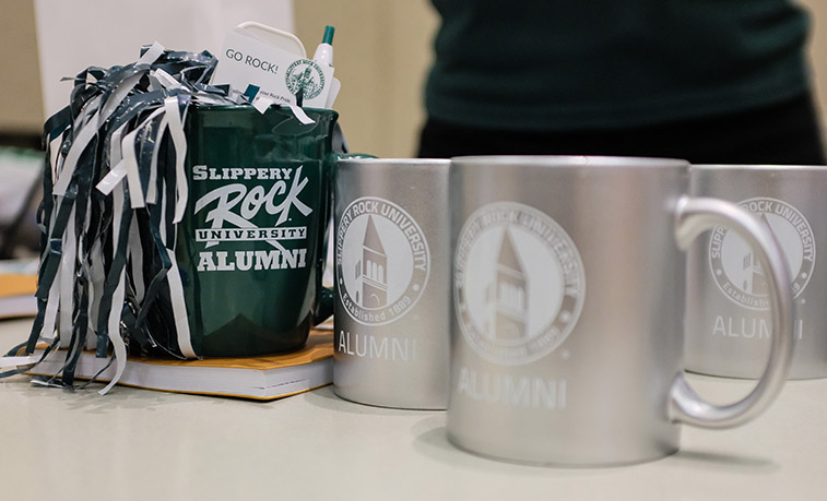 SRU Alumni mugs on display