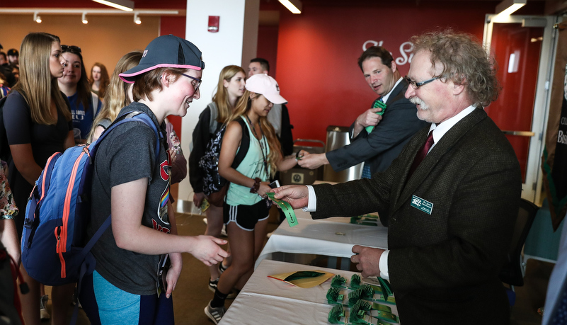 Students receiving their honors ribbons