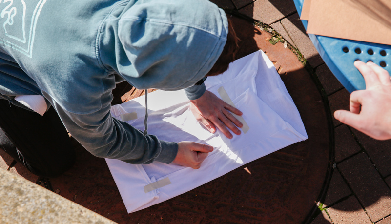 Students making prints for shirts