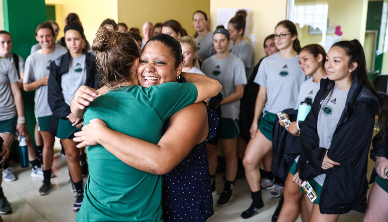 Hugs after dropping off school supplies