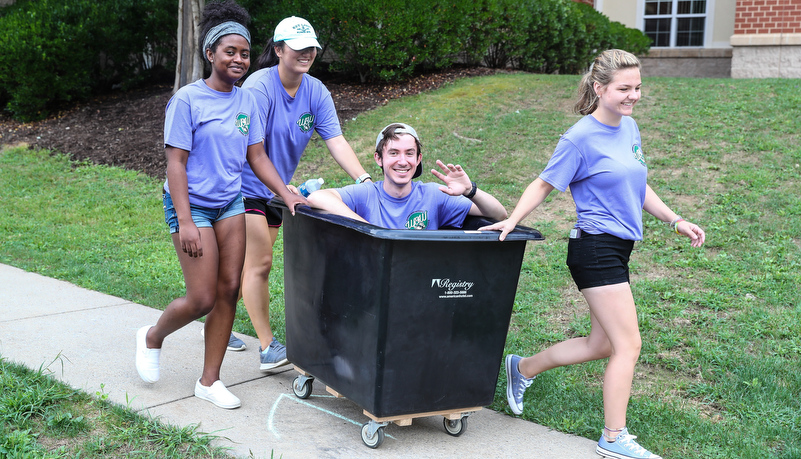 Students helping with move in day