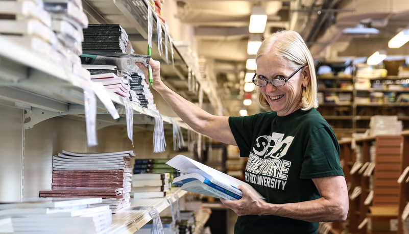 Bookstore worker picking orders